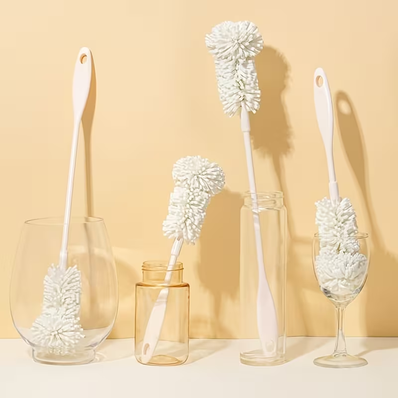 Two sponge cleaning brushes, suitable for bottles and cups.