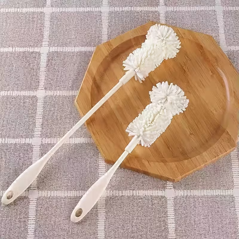 Two sponge cleaning brushes, suitable for bottles and cups.