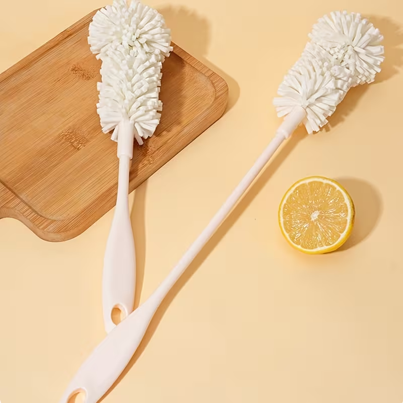 Two sponge cleaning brushes, suitable for bottles and cups.