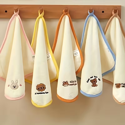 A set of 5 ultra-soft coral fleece towels decorated with cute animal patterns.