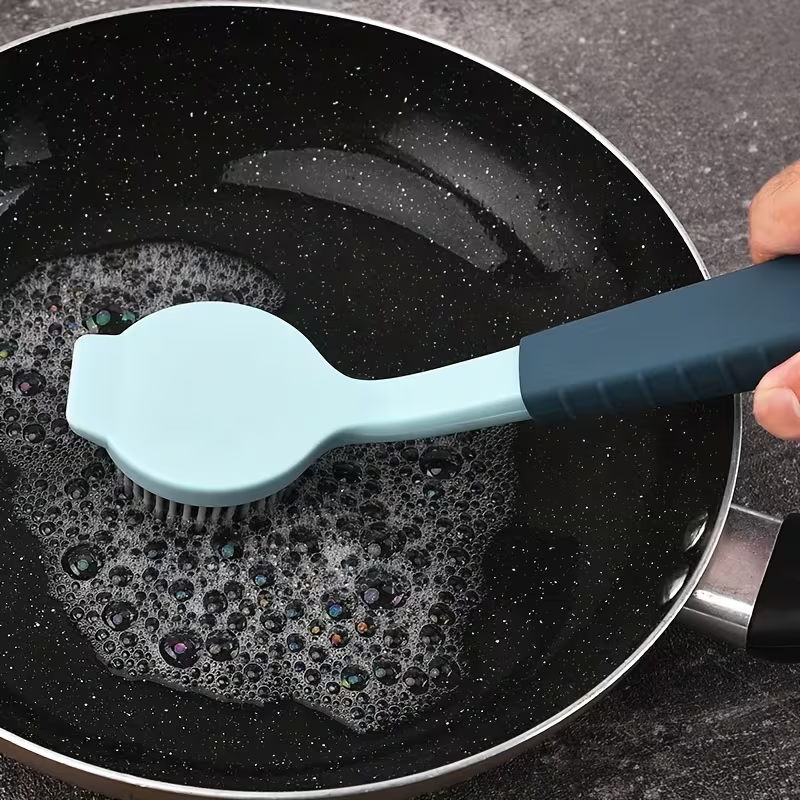 Durable PP long-handled cleaning brush - soft silicone bristles for efficient cleaning.