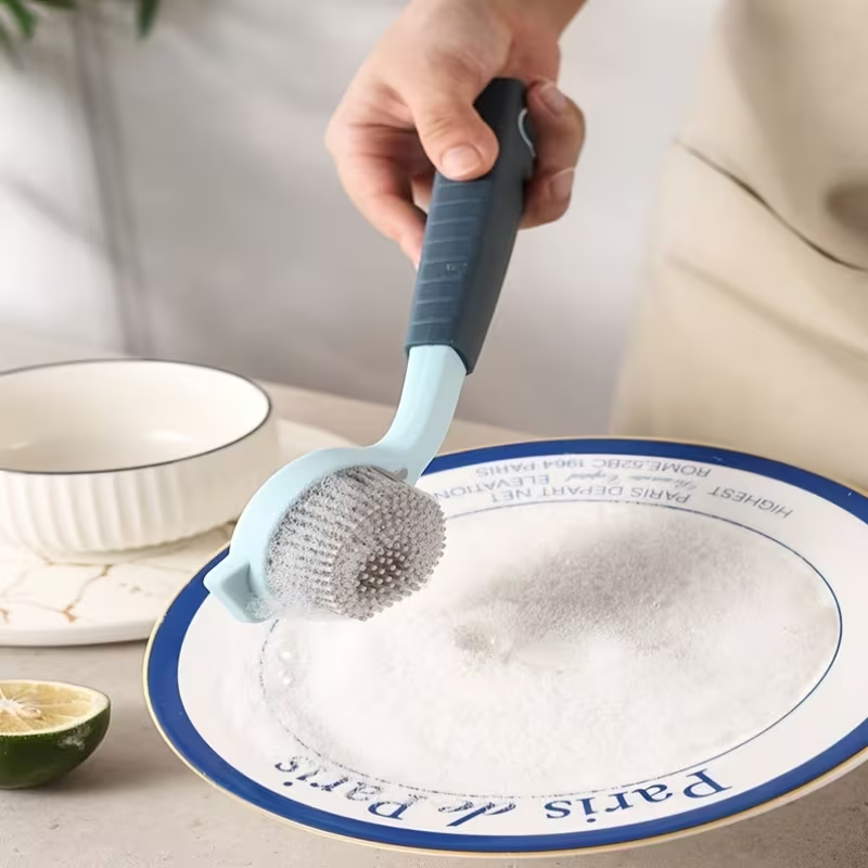 Durable PP long-handled cleaning brush - soft silicone bristles for efficient cleaning.
